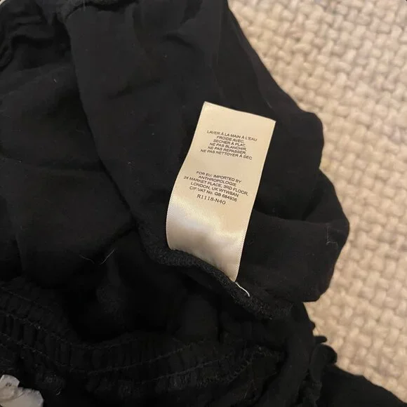 Anthropologie Lilka Pom-Trimmed Off-The-Shoulder Romper - Picture 9 of 10